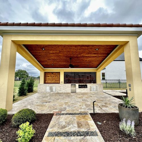 Craft an enchanting patio escape using sophisticated pergolas, snug patio covers, and gentle ambient lighting north texas