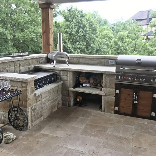 Elegant outdoor kitchen and living space in Colleyville 76034