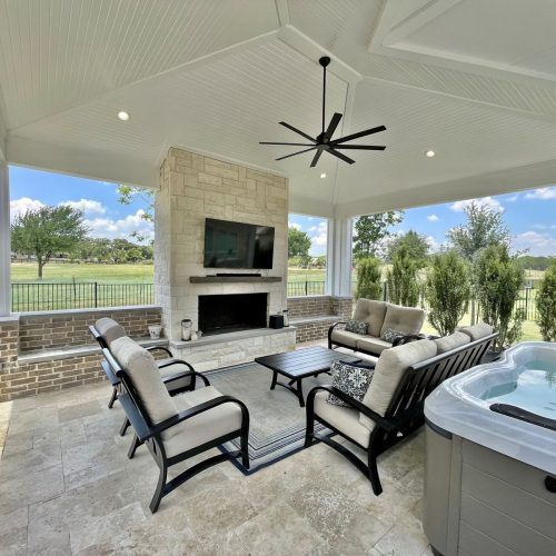Craft an inviting outdoor nook** using sophisticated pergolas, comfortable patio covers, and gentle ambient lighting in Lewisville 75056
